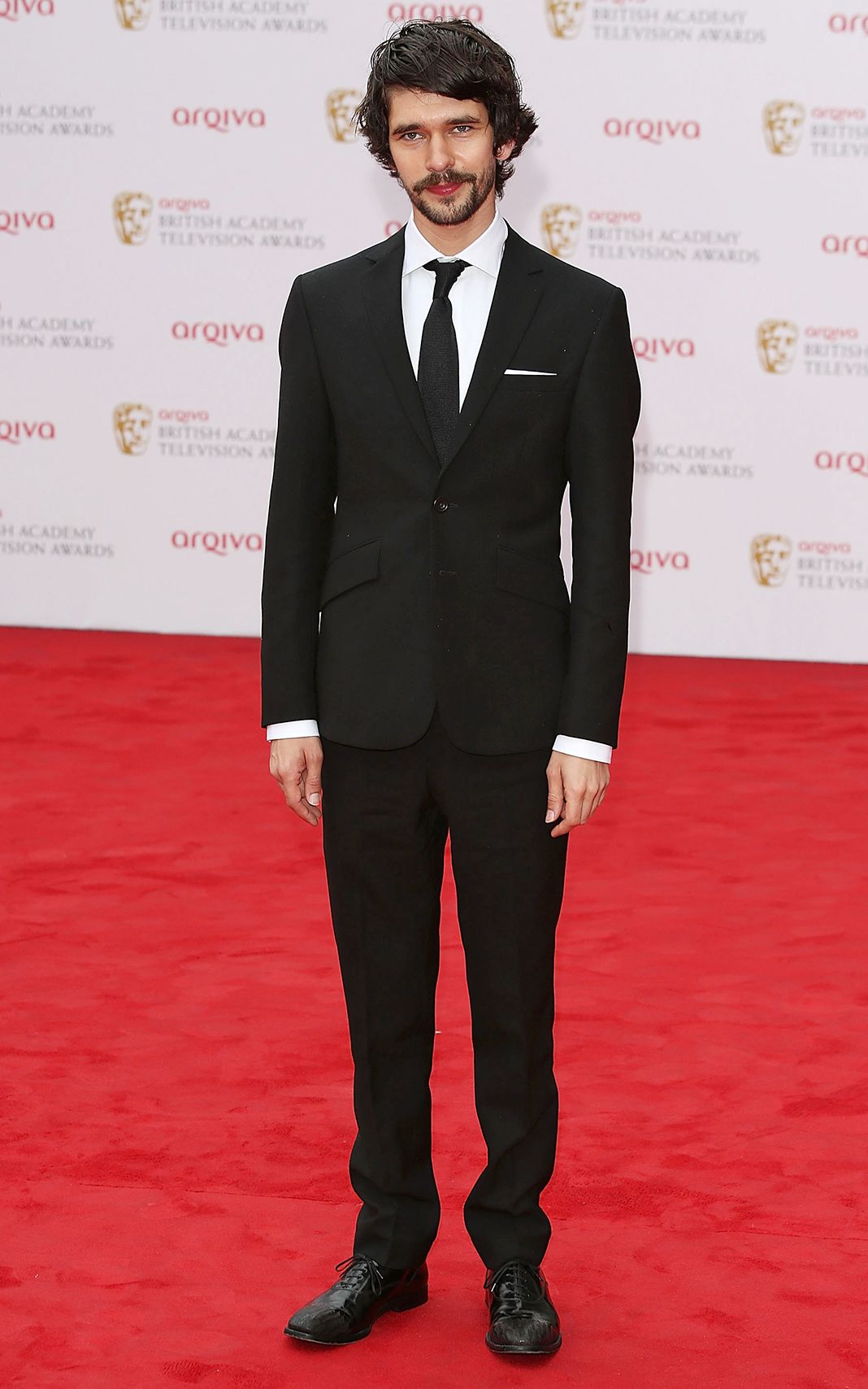 Бен Уишоу на церемонии награждения Arqiva British Academy Television Awards 2013, 12 мая 2013 года в Лондоне. Бен Уишоу на церемонии награждения Arqiva British Academy Television Awards 2013