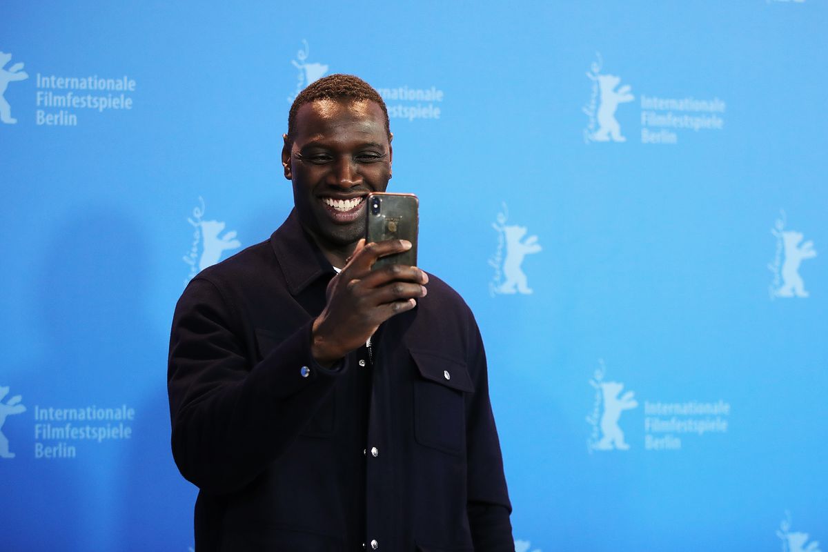 Омар Си на фотоколле фильма «Ночной конвой» во время 70-го Берлинского международного кинофестиваля