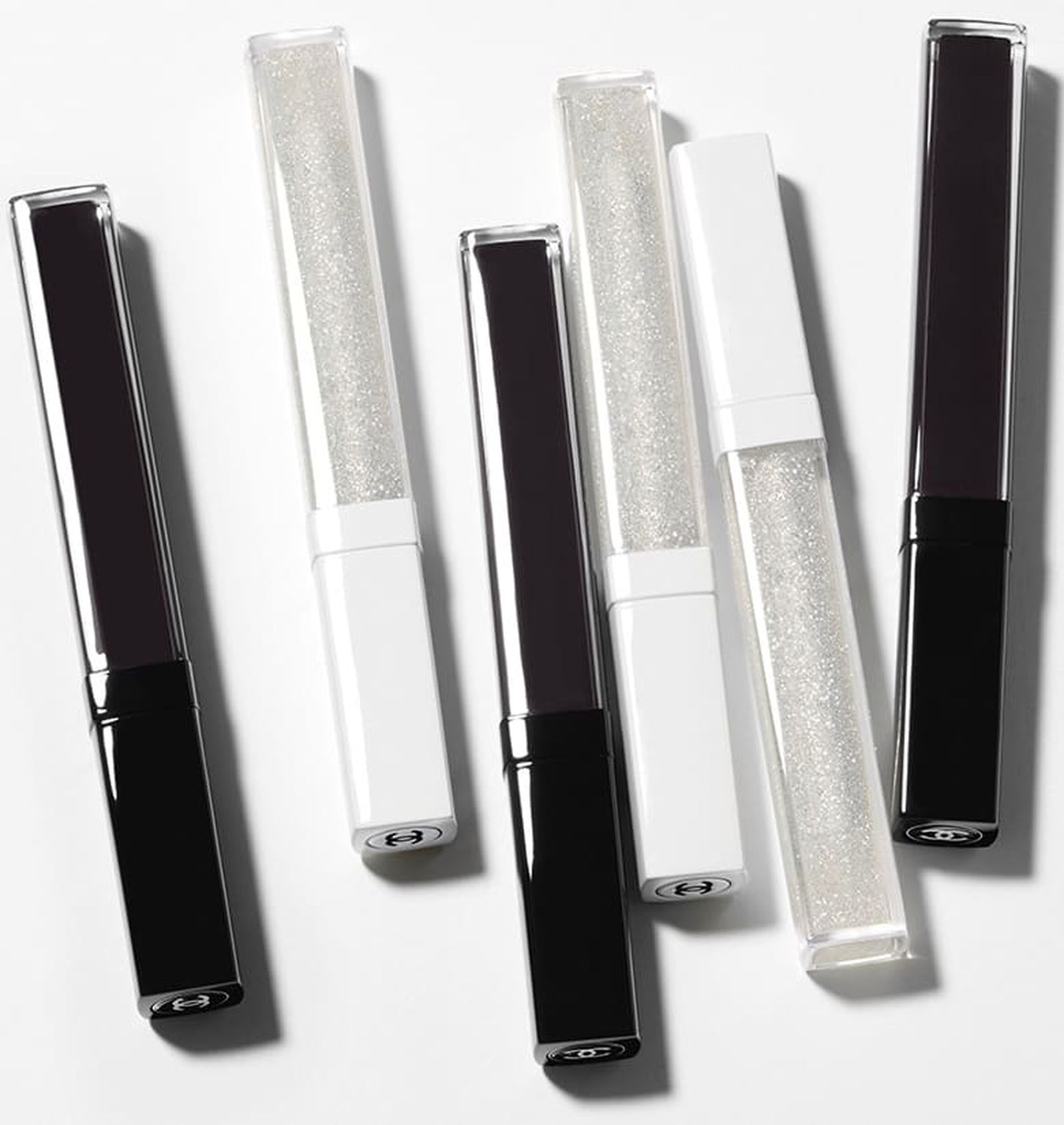 Chanel, увлажняющий ультраглянцевый блеск для губ Rouge Coco Gloss, оттенки: Laque Noire, Crystal Clear