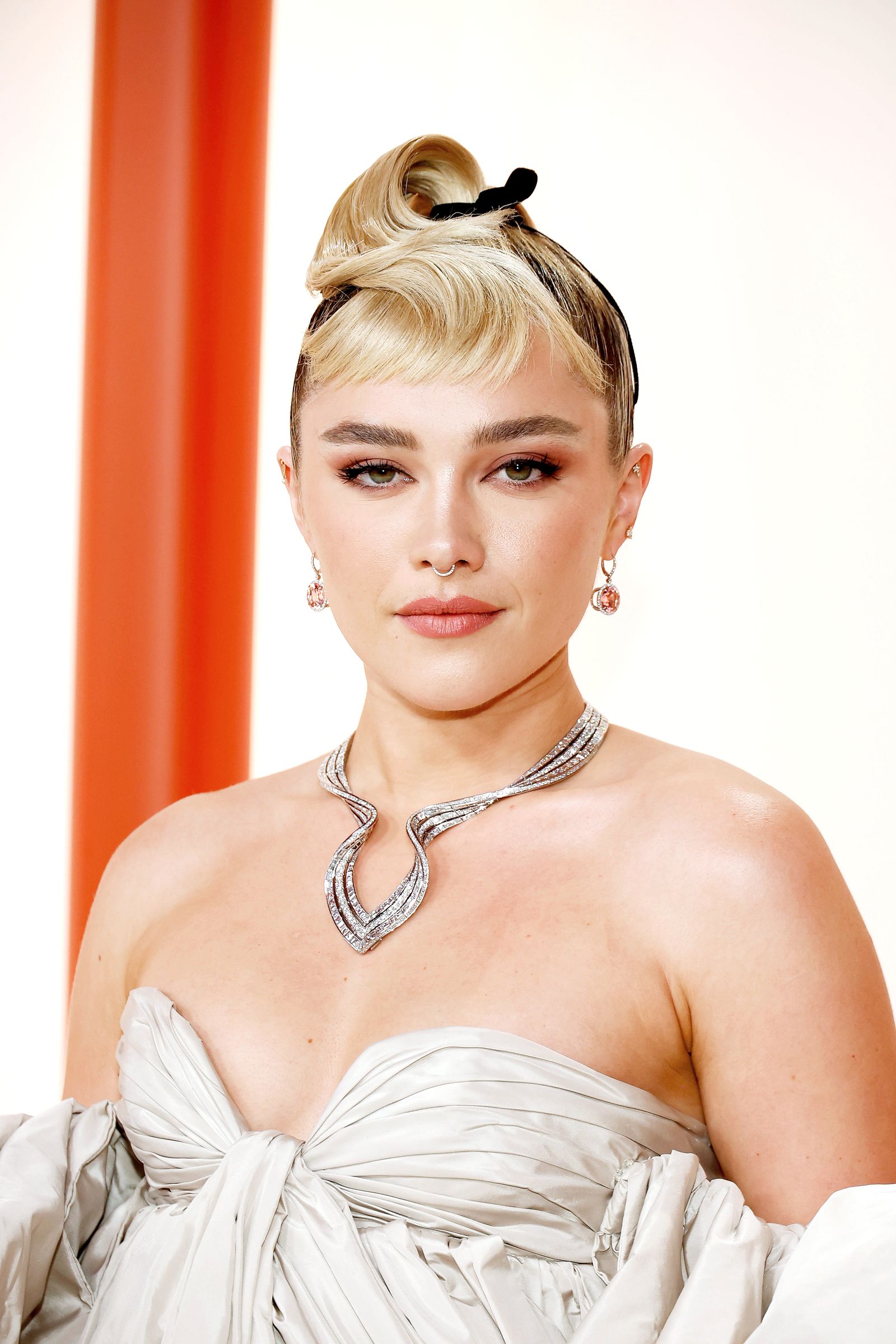 Флоренс Пью в Tiffany & Co. на 95-й ежегодной церемонии вручения премии «Оскар», 12 марта 2023 г.